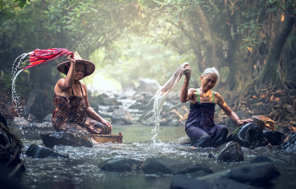 Senior women washing