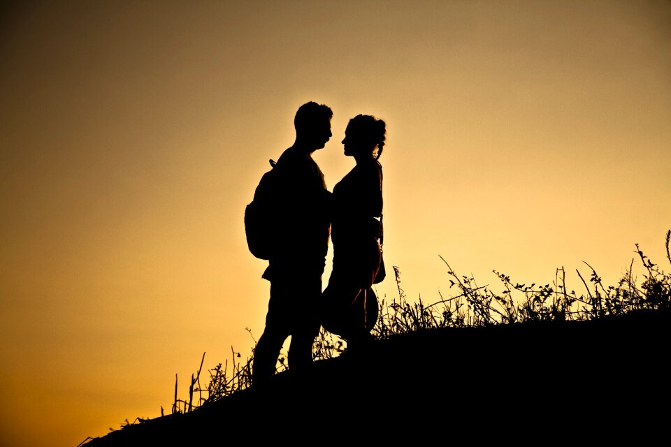 Silhouette couple sunset
