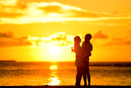 Sunset couple hugging photo