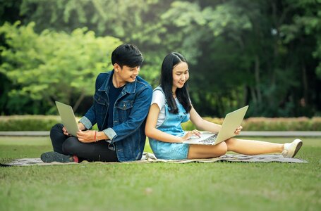 Students couple laptop computer photo