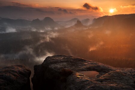 Sunrise mountain fog photo
