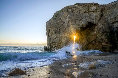 Sea coast rock sunset