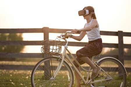 Vr headset woman bicycle photo