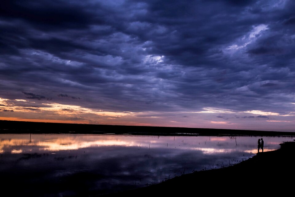 Sunset river couple