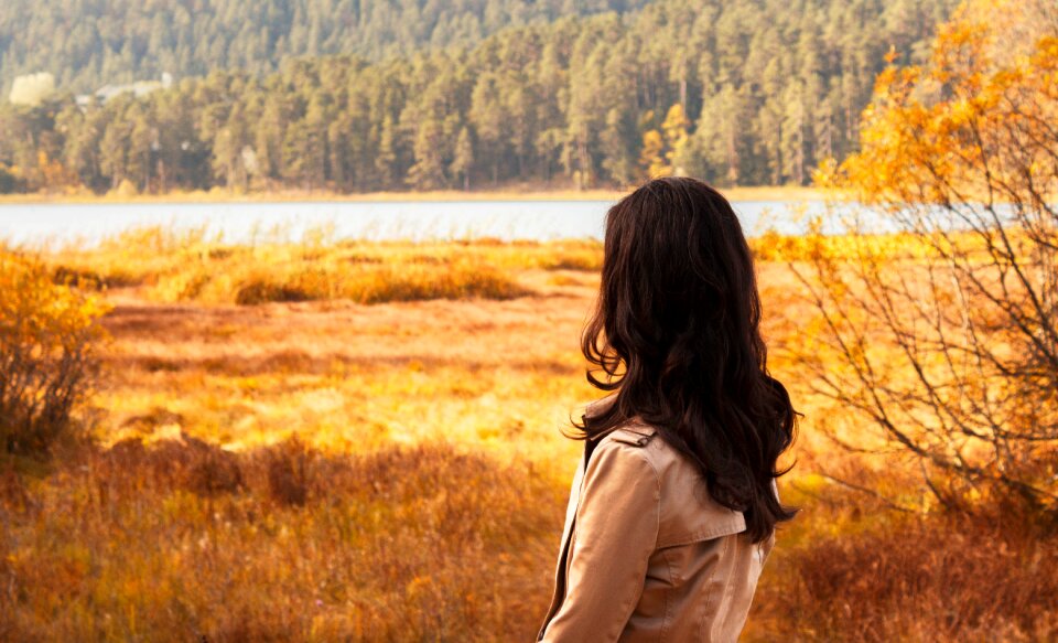 Woman autumn grass