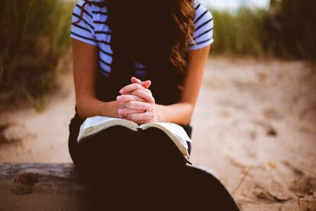 Woman bible praying photo