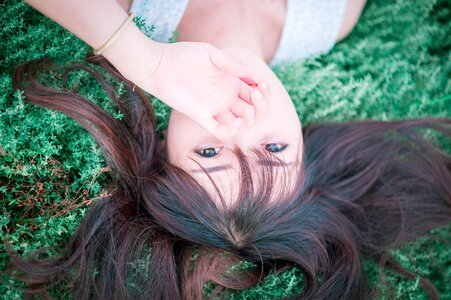 Woman girl portrait laying photo