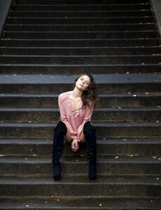 Woman girl sitting stairs photo
