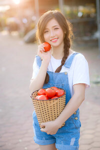 Woman girl tomato photo