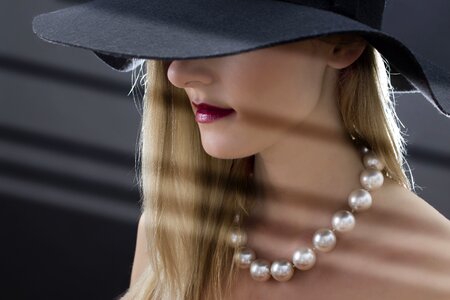 Woman hat necklace photo