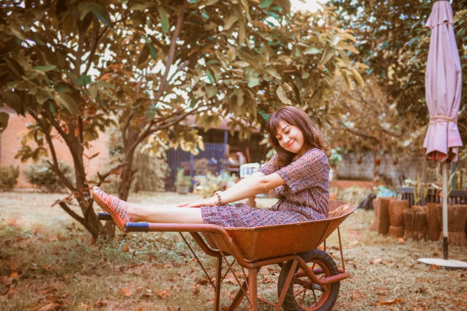 Woman girl portrait wheelbarrow