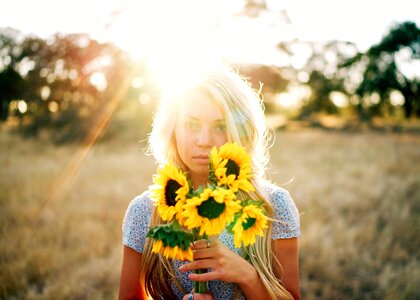 Woman girl sunflowers