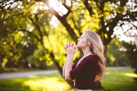 Woman praying photo
