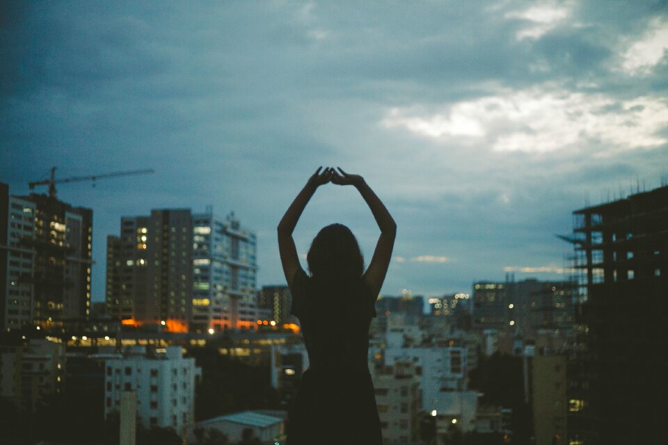 Woman stretching cityscape
