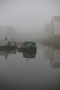 Boat fishing fog photo