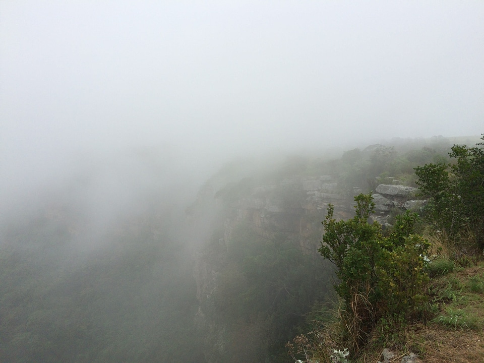 Bush cliff clouds photo