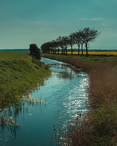 Blue countryside creek photo