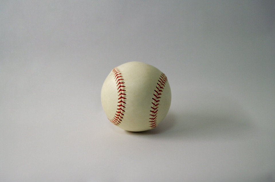 8 A ball used in playing baseball