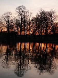 Water sunset mirroring
