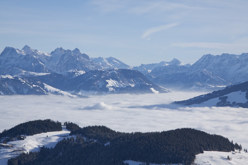 Winter snow above the clouds photo