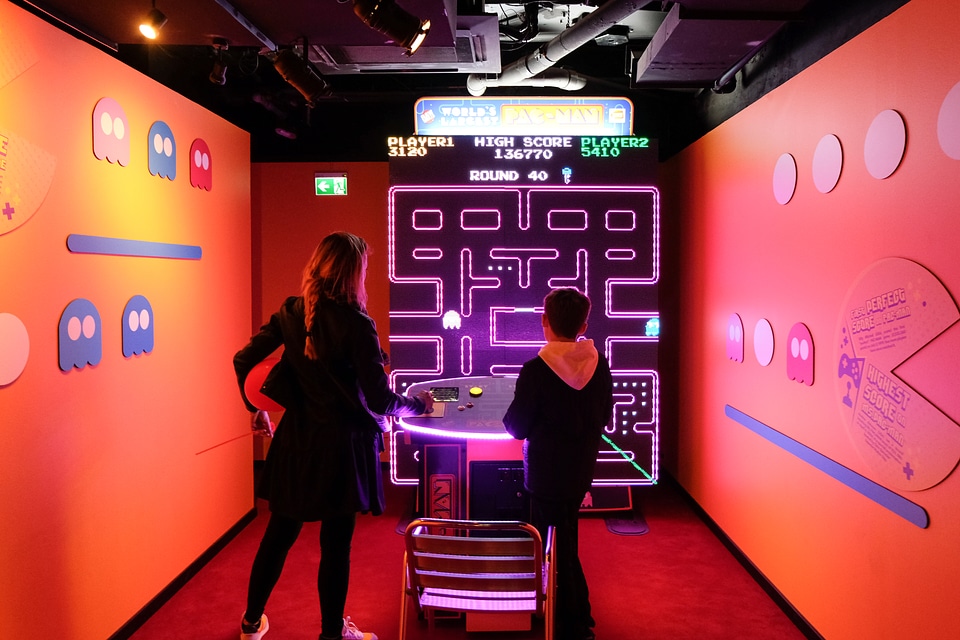 Mother and Child Playing PAC-MAN