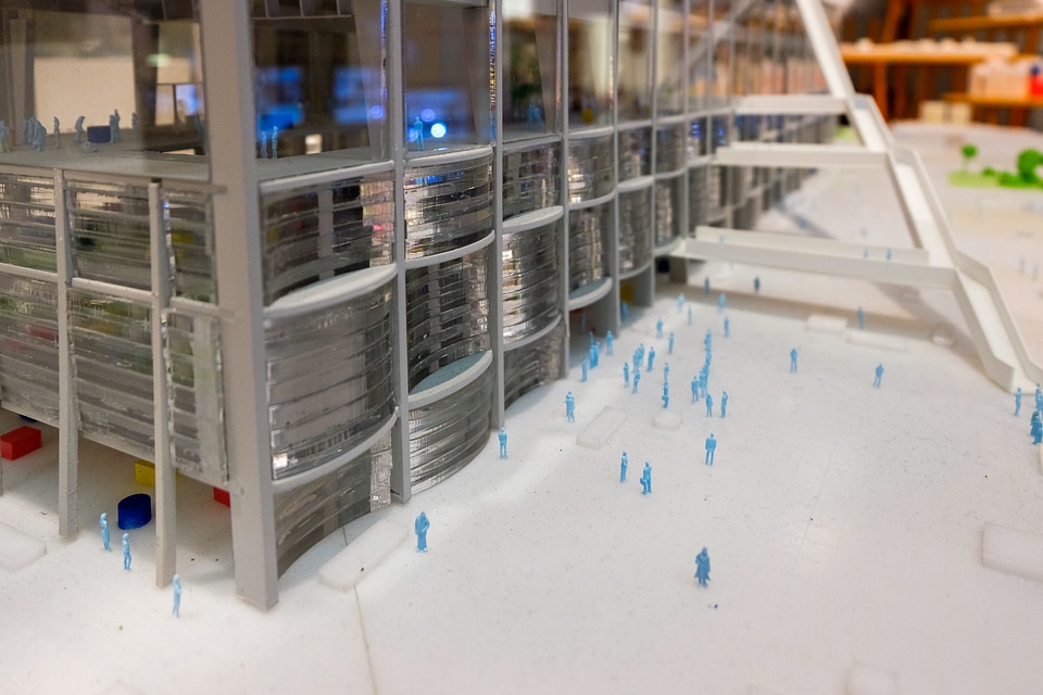 Small Blue People on a Scale Model