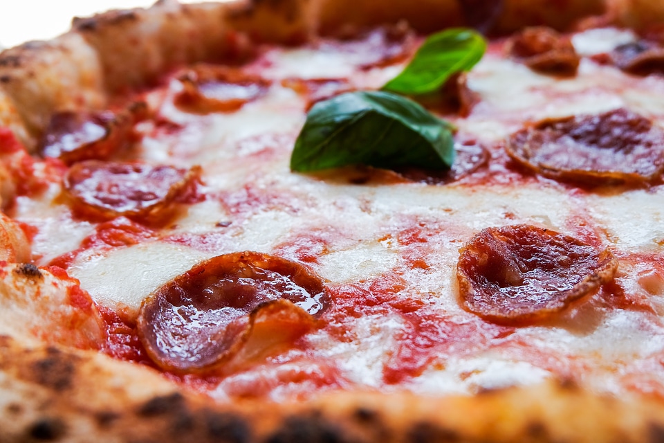 Pepperoni Pizza with a Mint Leaf photo