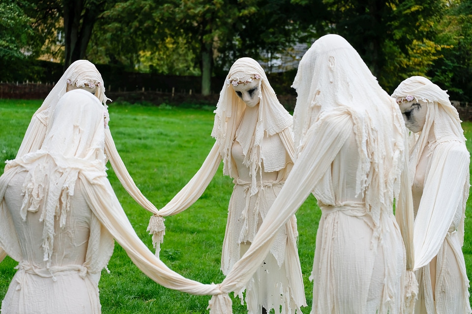 Scary Nymph Group Holding Hands