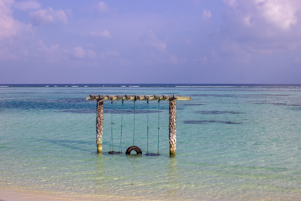 Couple Swing Placed in the Water
