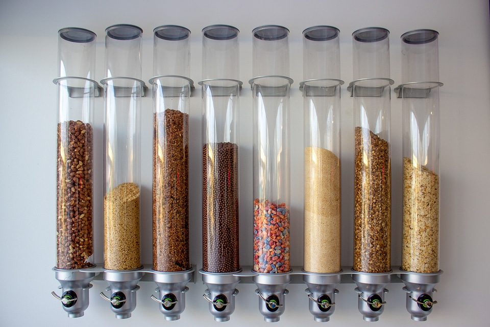 Cereal Dispensers Offering Various Kind of Cereals on a Self Service Breakfast Counter in a Hotel Restaurant