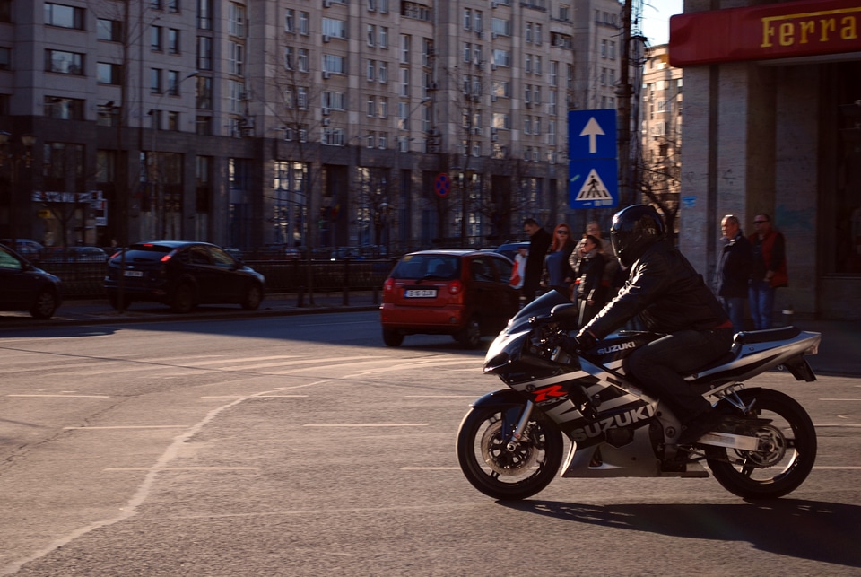 Biker Rides the a Motorcycle in the City Downtown