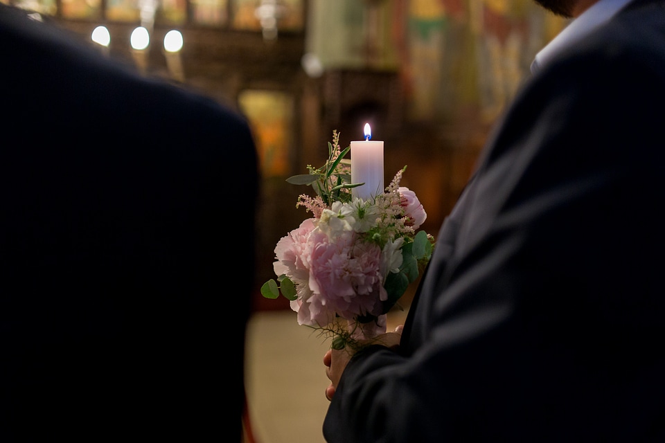 Godfather holding Wedding Candle photo