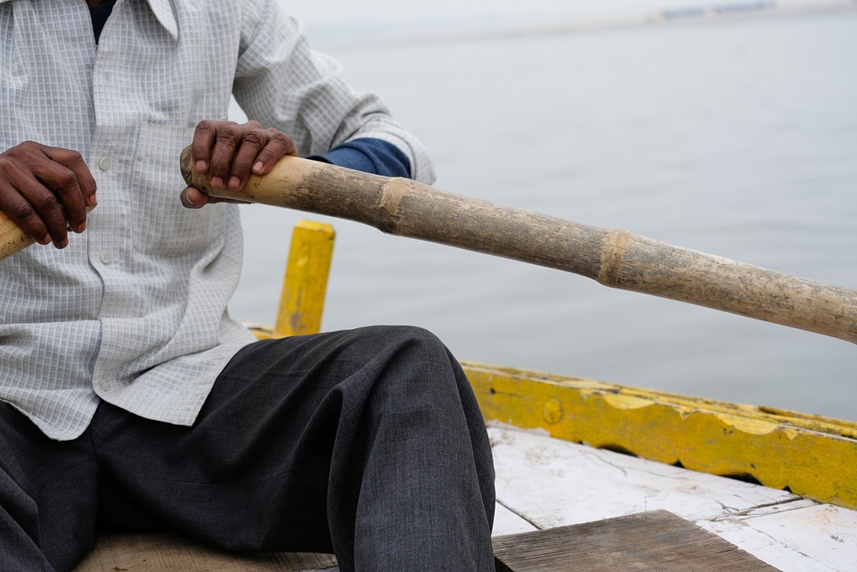 Man Rowing Boat in Ganges