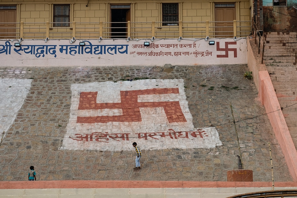 Kids Standing in Front of a Peace Sign Mural