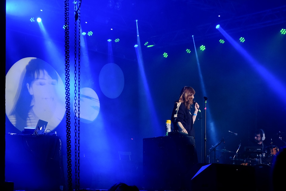 Performing Artist with Cool Projections Behind