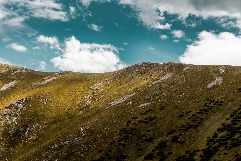 Detail of mountain ridge with blue sky photo