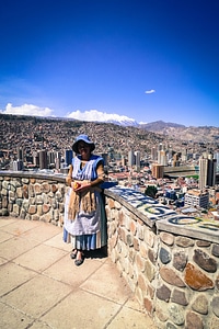 Quechua lady with La Paz in the background, Bolivia. photo