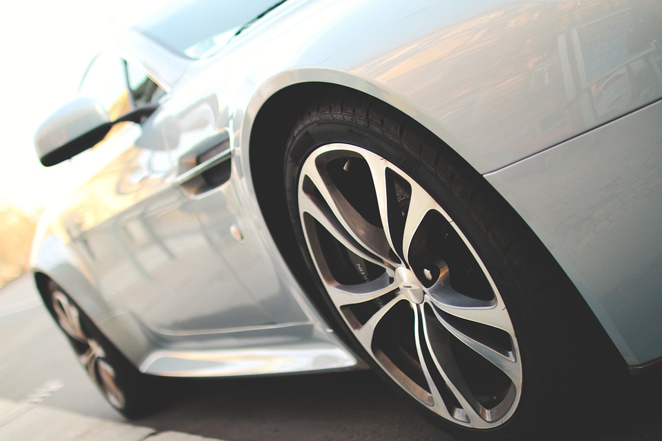 Super luxury silver car parked on the street
