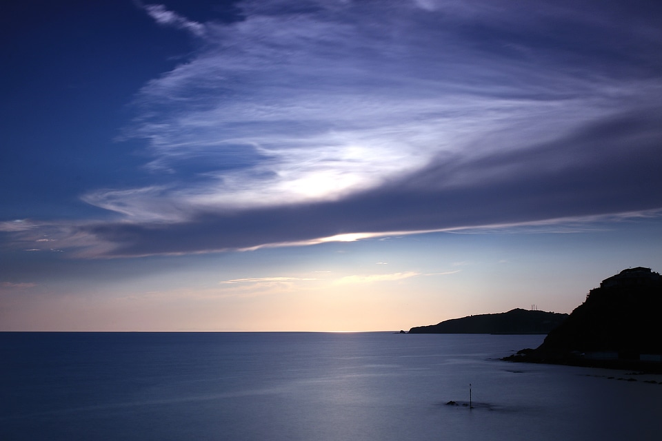 Cold sunset over the sea surface
