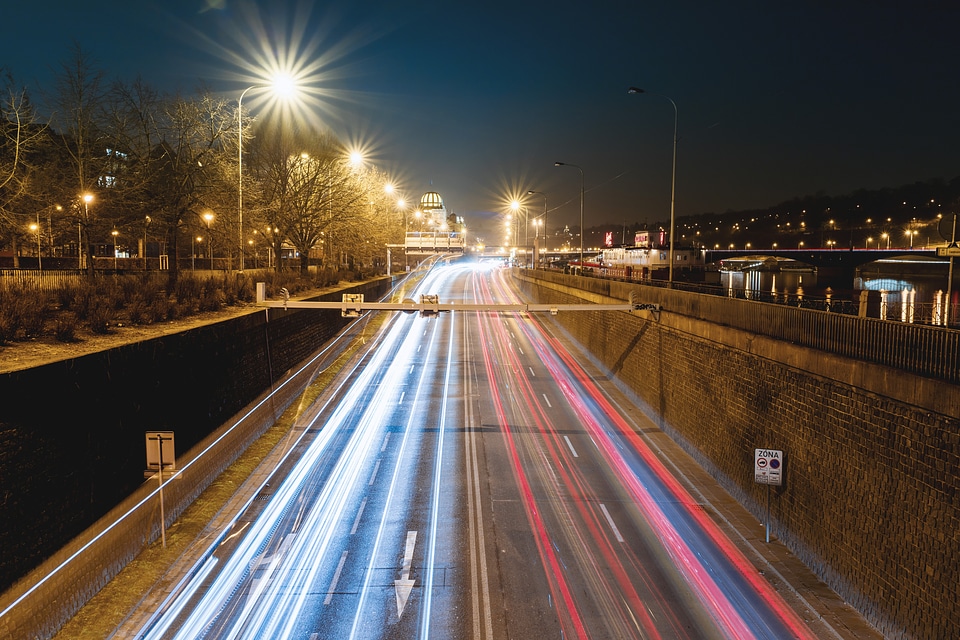 2 Car lights on the night highway in the city photo