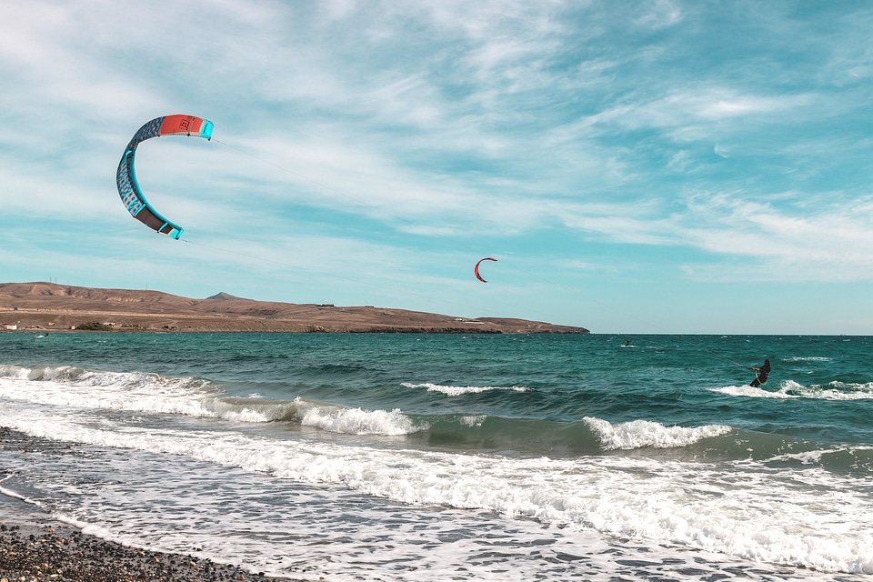Flying paragliding on the beach