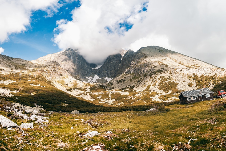 Amazing view! Summer landscape in mountains and the dark blue sky with clouds