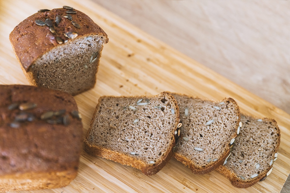 Bread on wooden cutting board photo