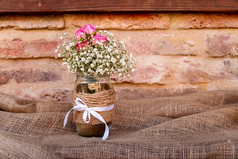 Decoration of beautiful small flowers in a glass