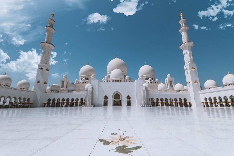 Sheikh Zayed Mosque in Abu Dhabi (UAE) with blue sky and clouds