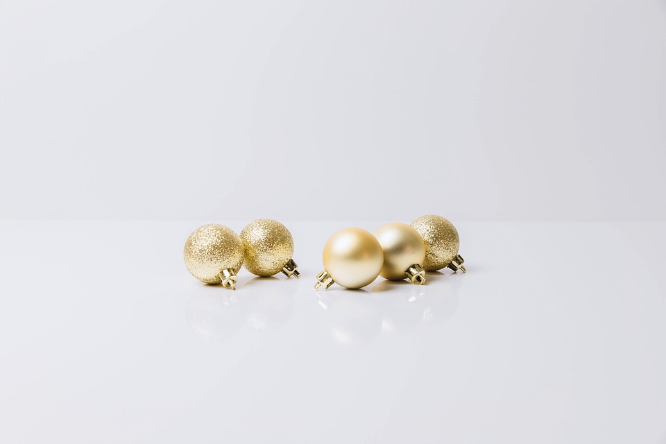 Golden Christmas Ornaments isolated on white