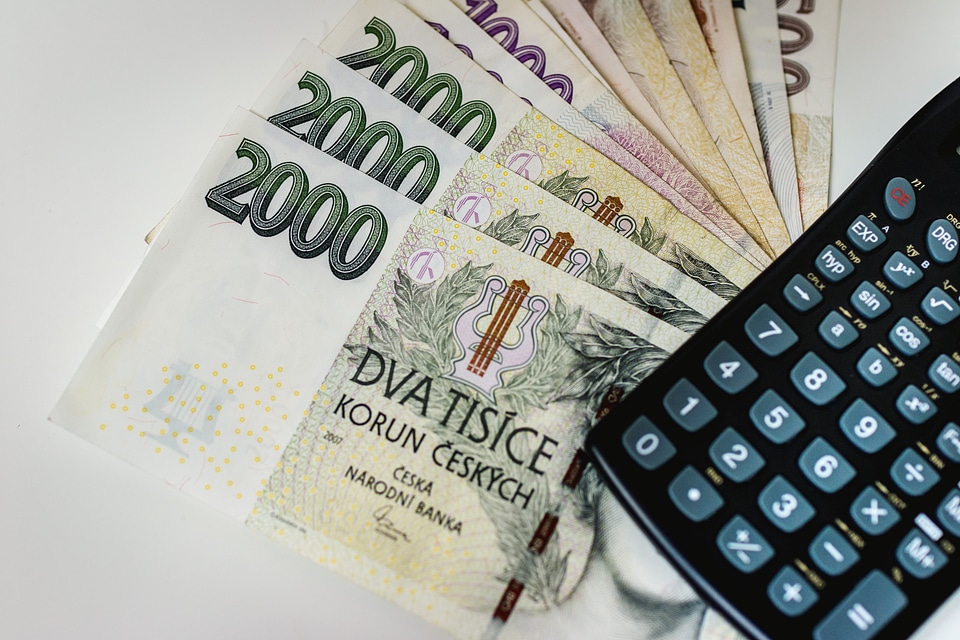 Counting and paying bills with Czech money