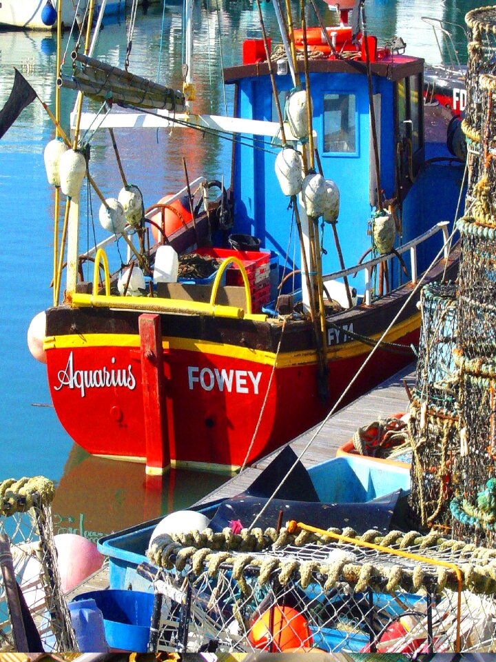 Quayside mooring red boat