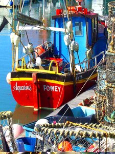 Quayside mooring red boat photo