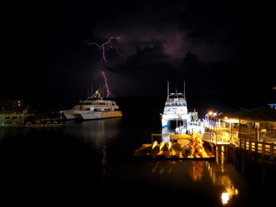 Sky thunder storm whale watch vessels photo
